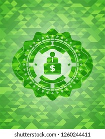 man working on computer icon inside realistic green mosaic emblem