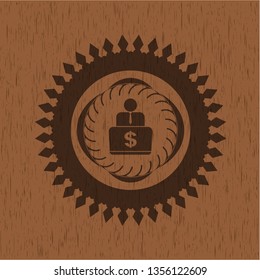 man working on computer icon inside wooden signboards