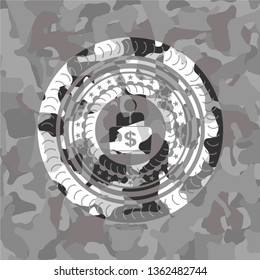 man working on computer icon on grey camouflaged texture
