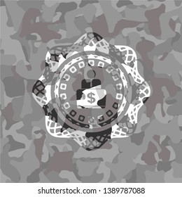 man working on computer icon on grey camouflaged texture