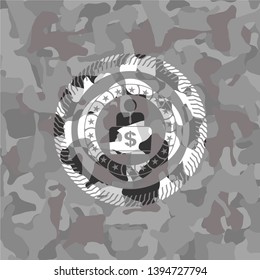 man working on computer icon on grey camo pattern