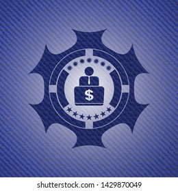 man working on computer icon inside badge with denim texture