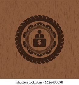 man working on computer icon inside wood emblem. Vintage.