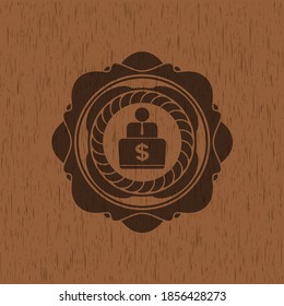 man working on computer icon inside wood signboards. 