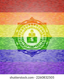 hombre trabajando en un icono de computadora sobre fondo de mosaico con los colores de la bandera LGBT. 