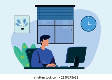 A man is working on his computer