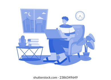Man Working On His Laptop On The Sofa At Home