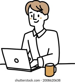 Ein Mann, der an einem Laptop arbeitet
