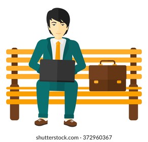 Man working on laptop.