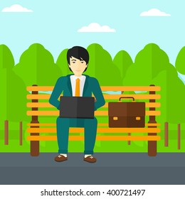 Man working on laptop.