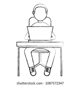 man working on a laptop computer office desk