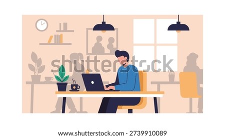 Man working on laptop in modern office space with coworkers
