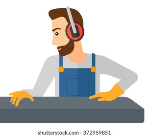 Man working on steel-rolling mill.