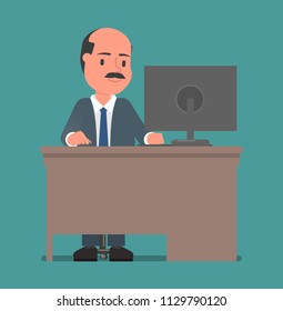 A man works with a computer.