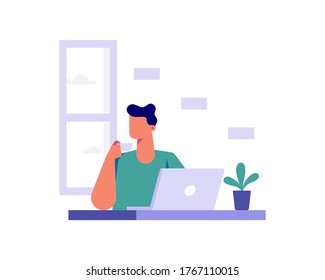 A man works on a laptop while drinking a cup of hot coffee