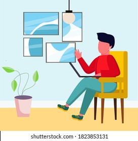 A man works remotely from home with a laptop. Concept of remote work, freelancer