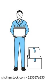 Management, managers, plant manager, a man in work wear holding a cardboard box.