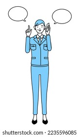 Management, managers, plant manager, a senior woman in work wear pointing while on the phone.