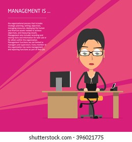 Manager sitting legs crossed at the desk with a computer.