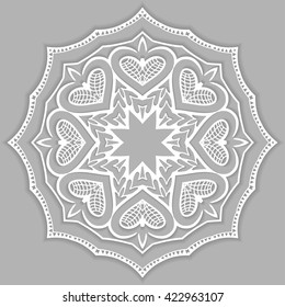 Mandala decoration, isolated white design element with shadow. Tribal ethnic floral mandala round pattern doodle art. Hand drawn geometric background. Christmas decor, stylized snowflake, flower, star