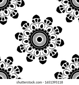 Mandala design concept of Rangoli with circles, curves, flower petals and leaves is in Seamless pattern