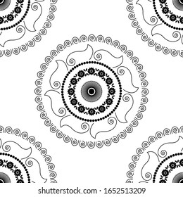 Mandala design concept of Rangoli with conch shells, spirals, flower petals and leaves is in Seamless pattern