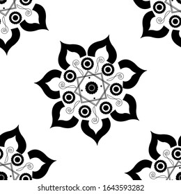 Mandala design concept of Rangoli with flower petals, circles and spirals is in Seamless pattern
