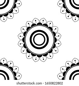 Mandala design concept of Rangoli with flower petals, buds and circles is in Seamless pattern