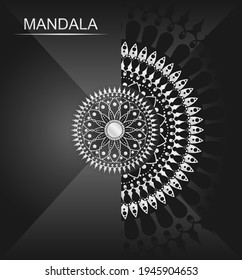 Mandala design on black folded paper