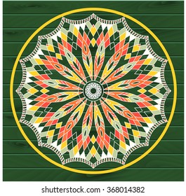 Mandala. Dreamcatcher. Ethnic decorative elements on the wooden texture