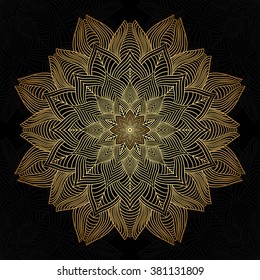 Mandala. Gold round ornament pattern on black background.
