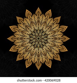 Mandala. Gold round ornament pattern on black background.
