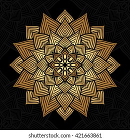 Mandala. Gold round ornament pattern on black background.