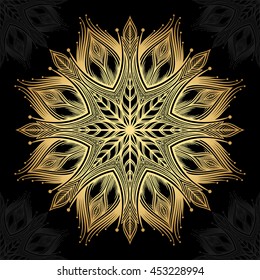 Mandala. Gold round ornament pattern on black background.