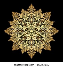 Mandala. Gold round ornament pattern on black background.