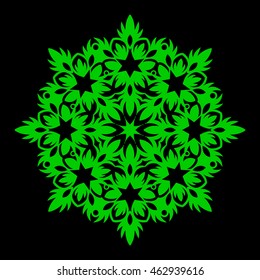 Mandala. Green round ornament pattern on black background.