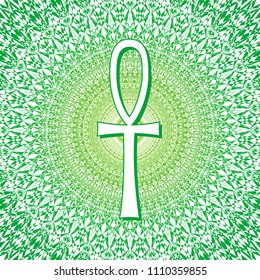 Mandala in green tones with the sign of the key of life. Circular openwork pattern. Vector graphics.