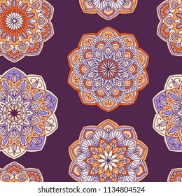 Mandala hand drawn vector seamless pattern. Colorful purple and orange ornate traditional background. Decorative oriental texture