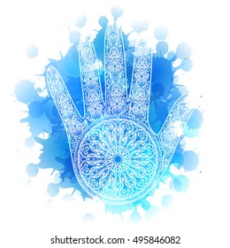 mandala on a palm on a blue background. vector illustration in oriental style