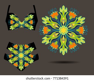 mandala on a swimsuit, a pattern for the design of a swimsuit, an ornament on clothes, fashionable women's clothing, a decor, a style of a boho
