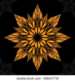 Mandala. Orange round ornament pattern on black background.