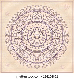 Mandala ornaments in doodle style with blue pen ink on vintage paper