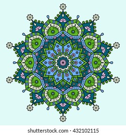 Mandala pattern in dark cyan blue, bright lime green, pink & creamy white on light blue background.