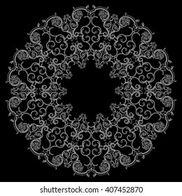 Mandala. Round ornament pattern on black background.