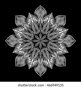 Mandala. Round Ornament Pattern on black background.