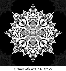 Mandala. Round Ornament Pattern on black background.