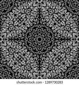 Mandala. Seamless pattern. Black and white painted leaves and branches. Sacred image. Vintage decorative elements.Can be used for wallpaper, textile, invitation card, wrapping, web page background.