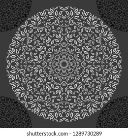 Mandala. Seamless pattern. Black and white painted leaves and branches. Sacred image. Vintage decorative elements.Can be used for wallpaper, textile, invitation card, wrapping, web page background.