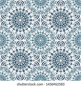 Mandala seamless pattern with rounded floral ethnic mandala ornament. Tribal pattern background