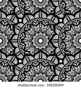 Mandala. Seamless texture with ethnic round ornament. Vector art